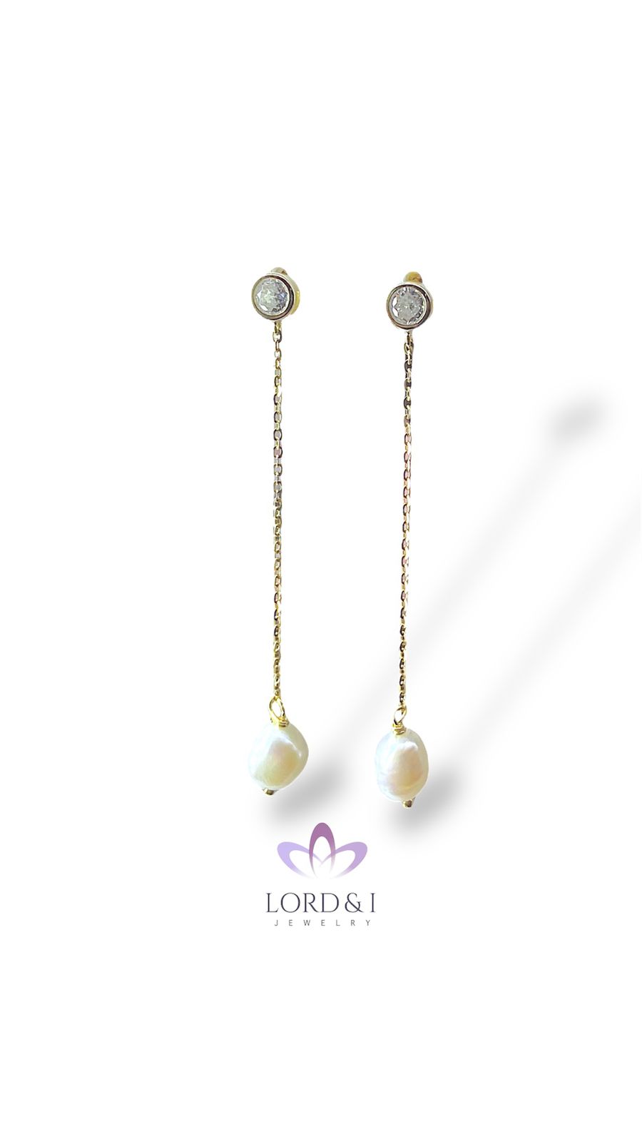 Aretes largos con perla